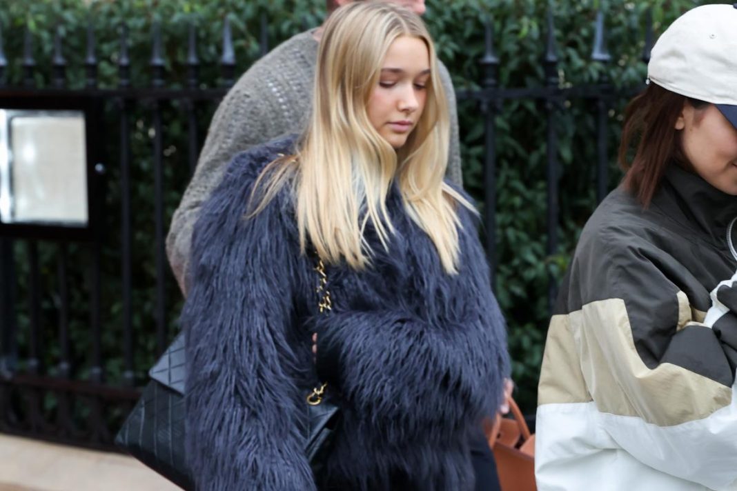 David and Victoria Beckham’s 14-year-old daughter, Harper, bundles up in fur coat and $4K vintage Chanel bag