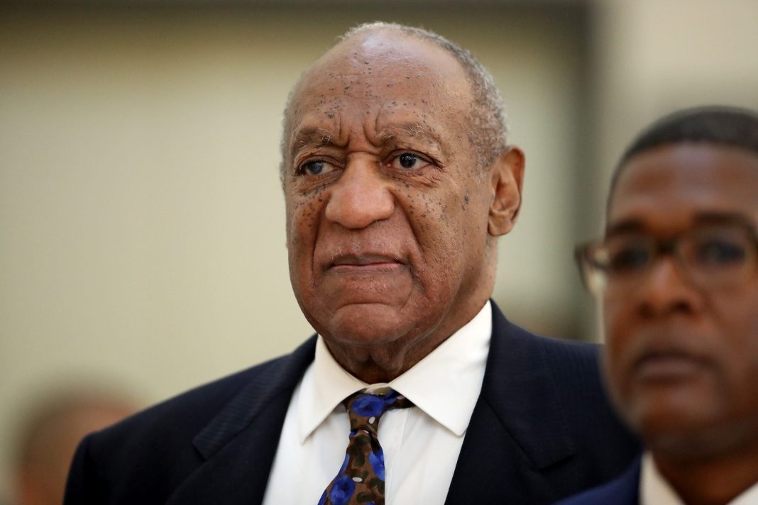Actor and comedian Bill Cosby returns to the courtroom after a break with his spokesman Andrew Wyatt at the Montgomery County Courthouse, during his sexual assault trial sentencing in Norristown, Pennsylvania, U.S. September 24, 2018. 