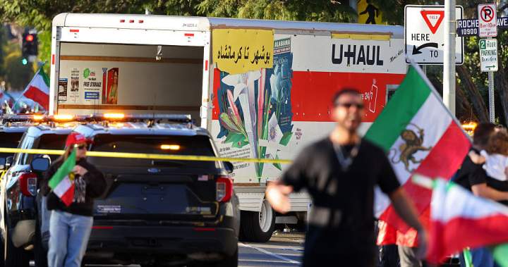 Protesters try to attack driver after truck speeds through L.A. anti-Iran protest