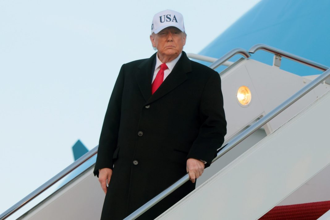 Donald Trump Flips Off Auto Worker After Being Taunted as “Pedophile …