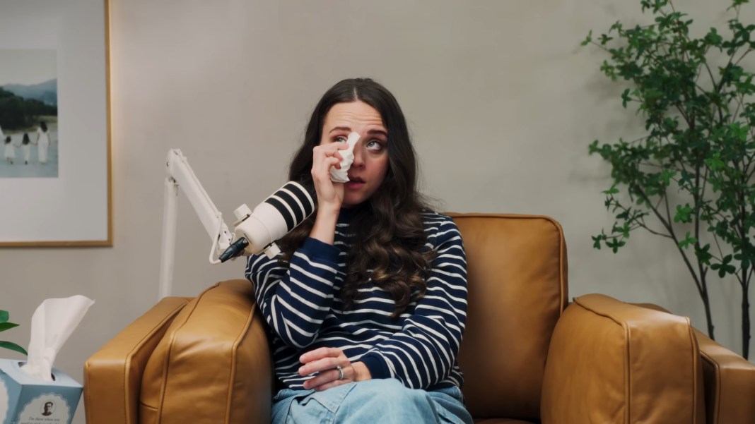 Jinger Duggar dries her eyes.