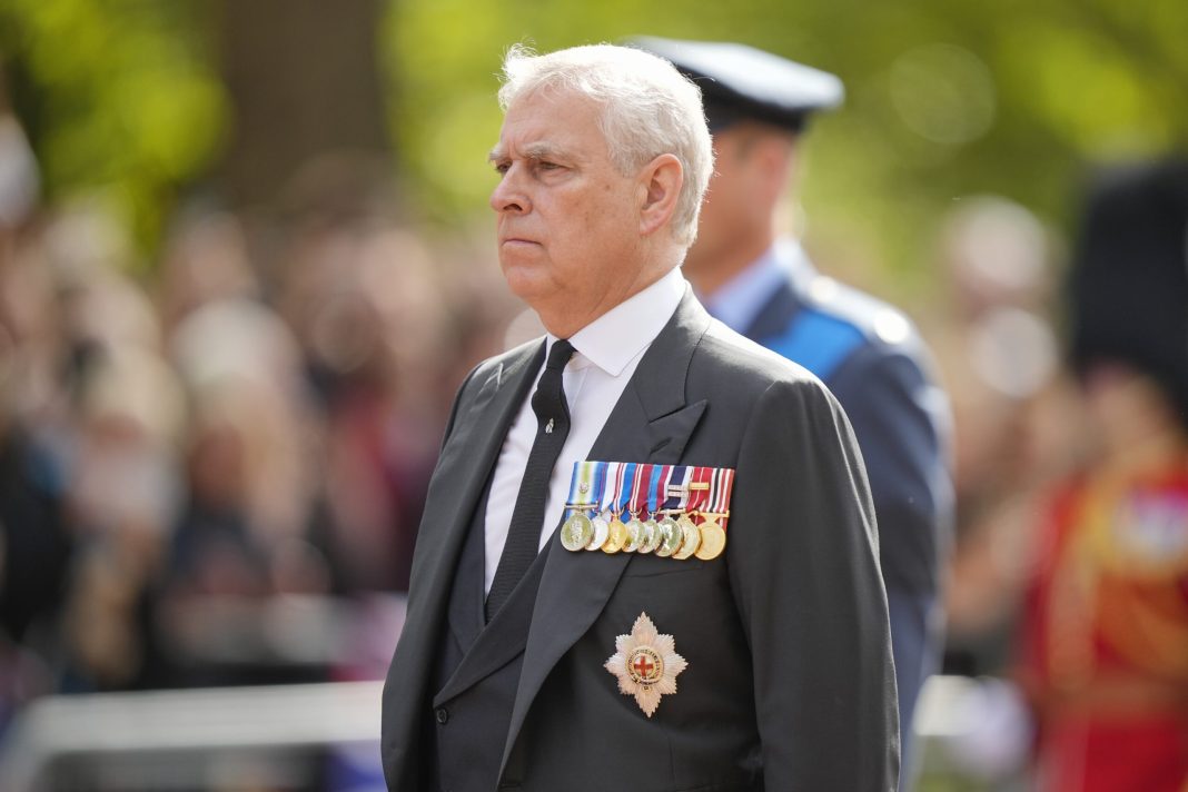 Prince Andrew, Duke of York walks behind the coffin during the ceremonial procession of the coffin of Queen Elizabeth II from Buckingham Palace to Westminster Hall on September 14, 2022 in London, United Kingdom.