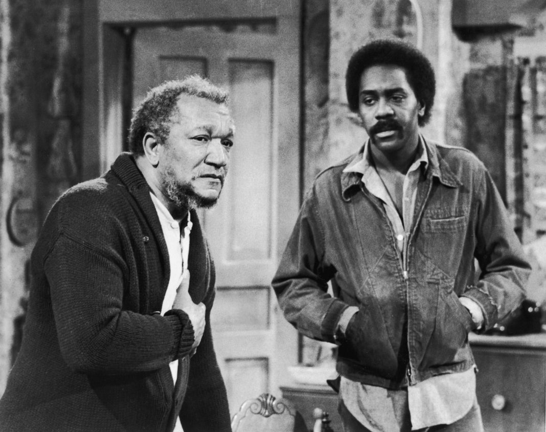 American actors Red Foxx (1922 - 1991) (left) Demond Wilson in a still from the television series, 