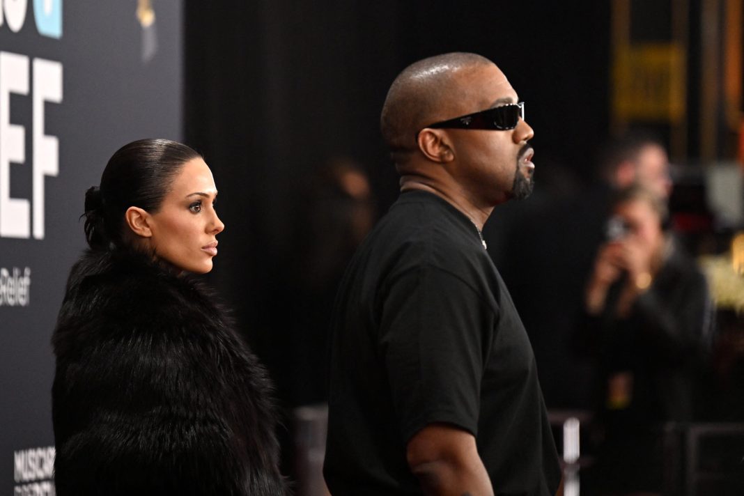 US rapper and producer Kanye West (R) and Australian model Bianca Censori arrive for the 67th Annual Grammy Awards at the Crypto.com Arena in Los Angeles on February 2, 2025.