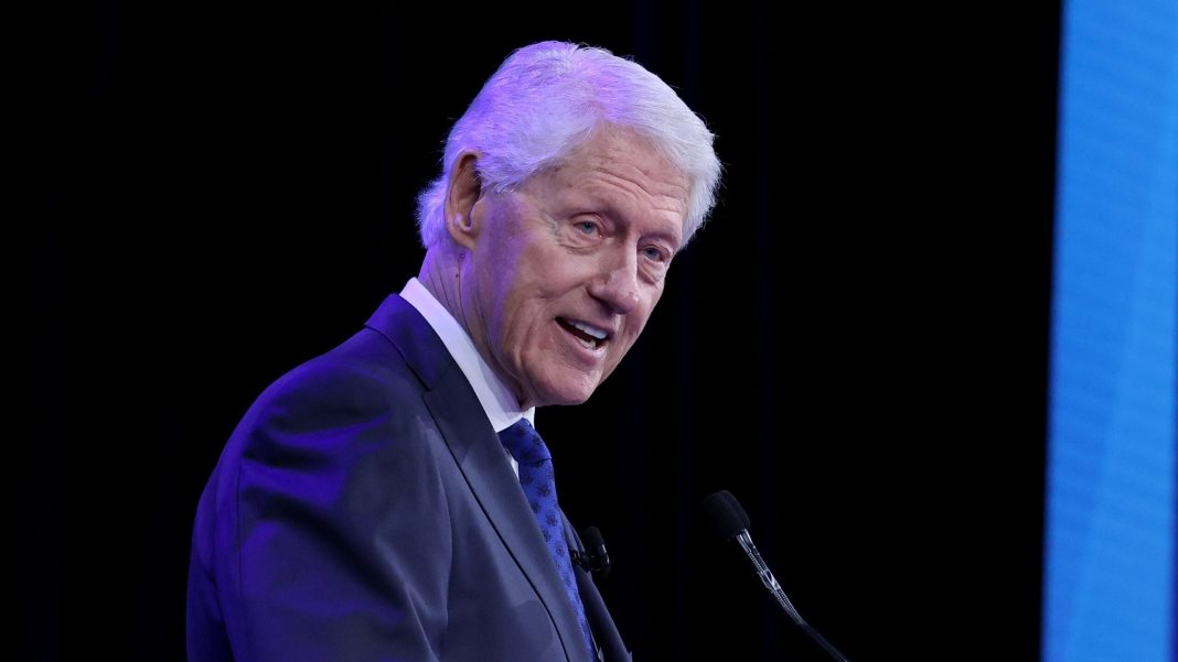 Bill Clinton Grins, Chuckles at Photo During Epstein Testimony (WTF, Dude?)