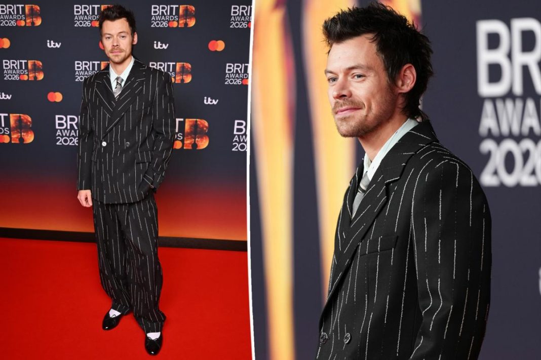 Harry Styles makes fashion statement in Chanel pinstriped suit, ballet flats at 2026 BRIT Awards