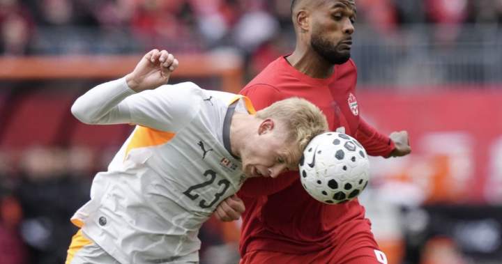 Canada battles back to tie Iceland 2-2