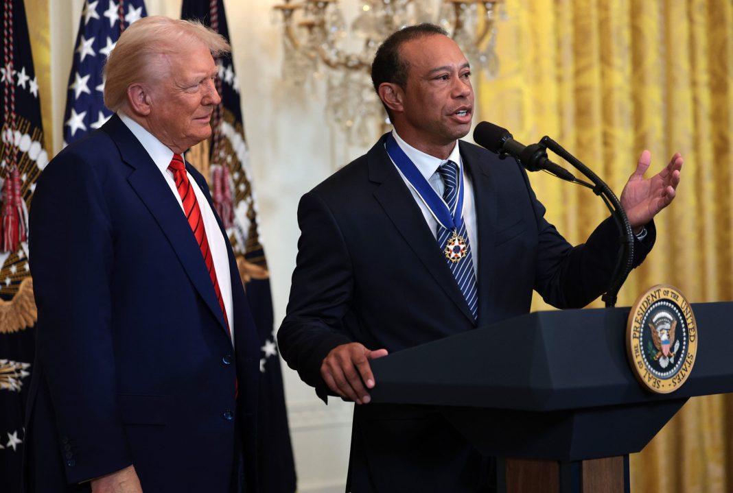 Golf legend Tiger Woods speaks alongside U.S. President Donald Trump during a reception honoring Black History Month in the East Room of the White House on February 20, 2025 in Washington, DC.