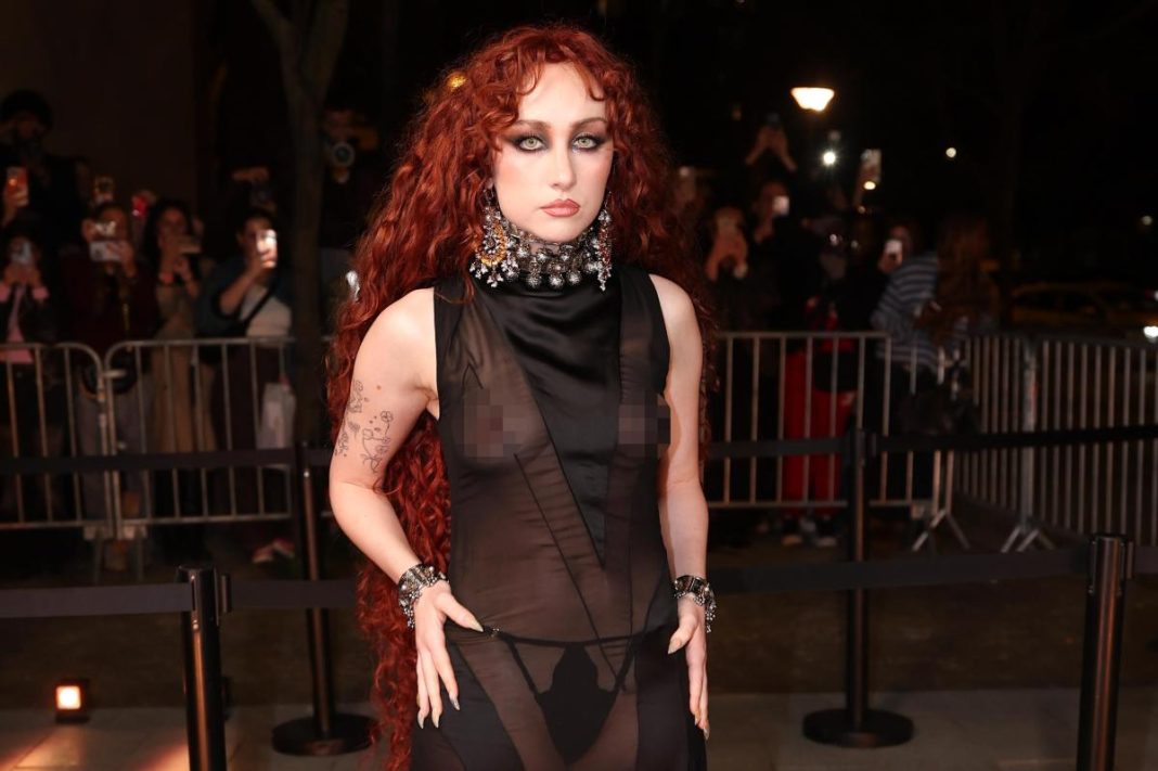 Chappell Roan leaves little to the imagination in see-through dress and thong at Paris Fashion Week