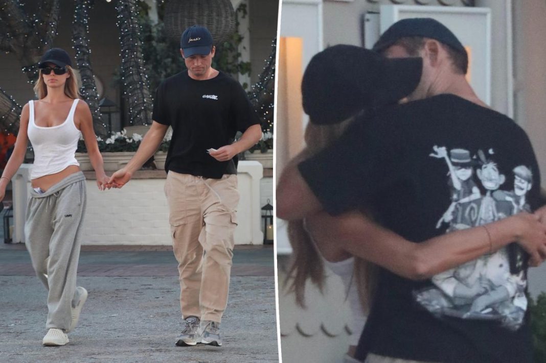 Brooks Nader and Taron Egerton passionately kiss during LA date night