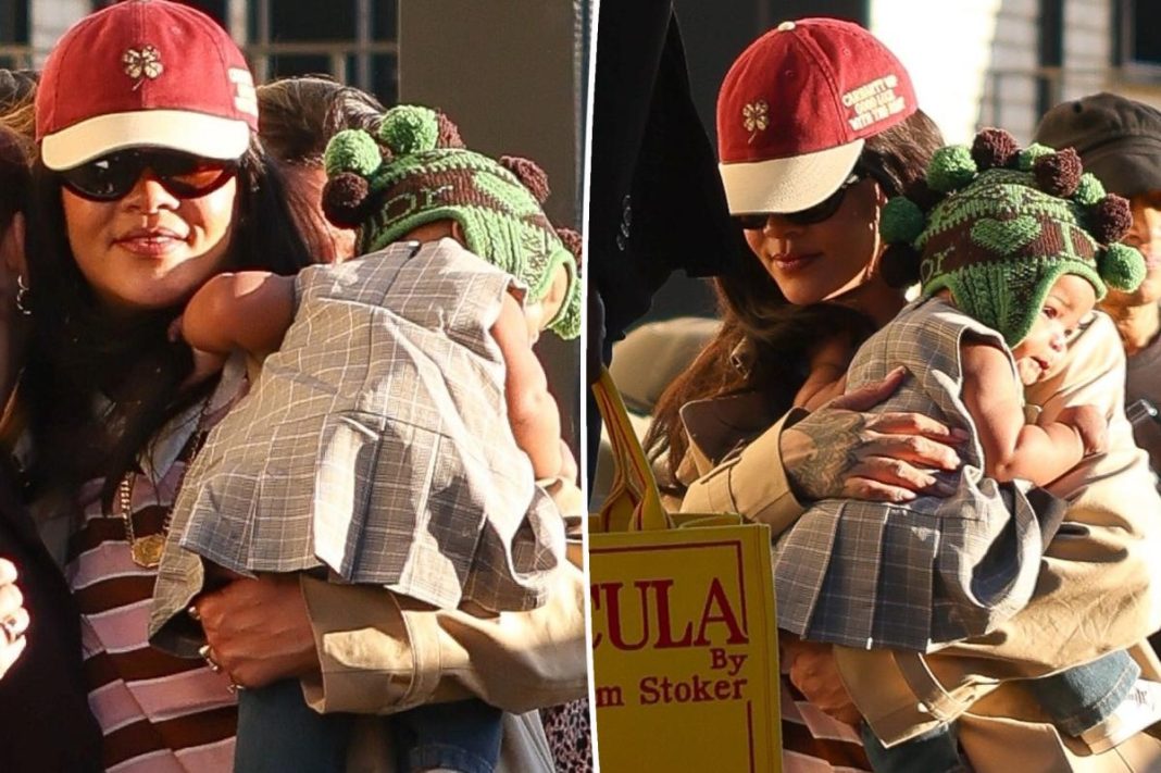 Rihanna’s 6-month-old daughter makes her first public appearance in vintage Dior, of course