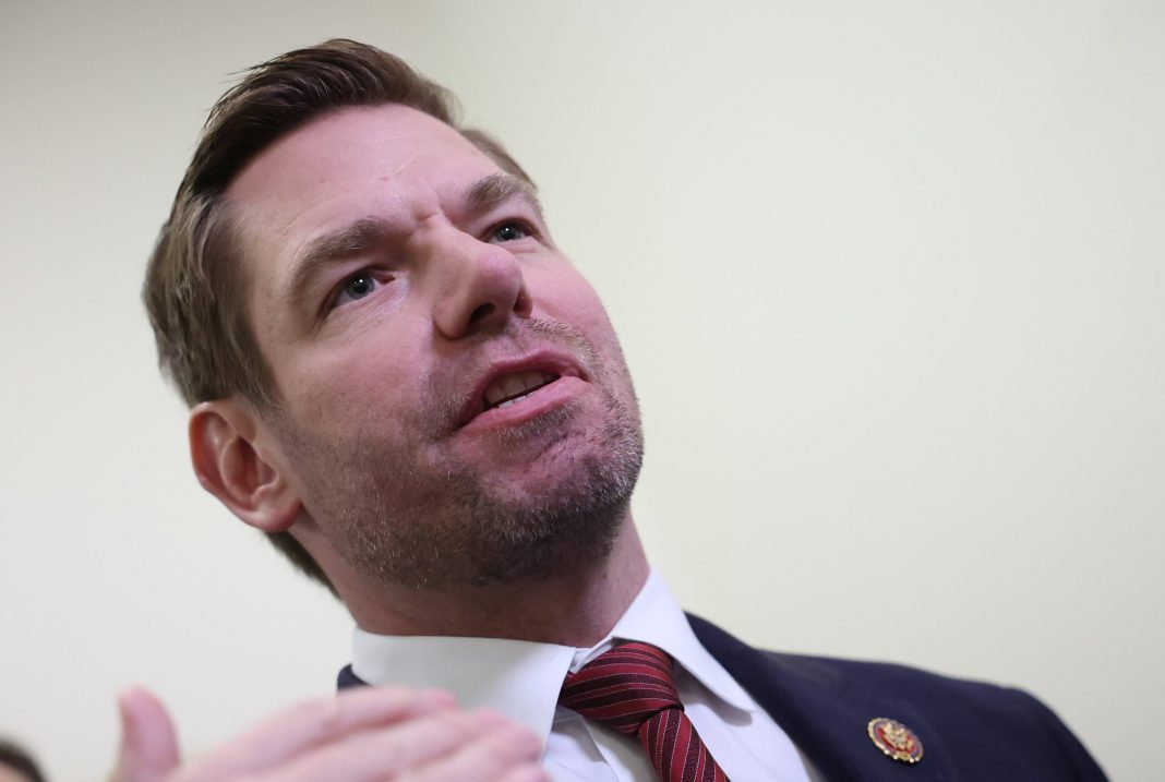 U.S. Rep. Eric Swalwell speaks to reporters in the Rayburn House Office Building on December 13, 2023 in Washington, DC. 