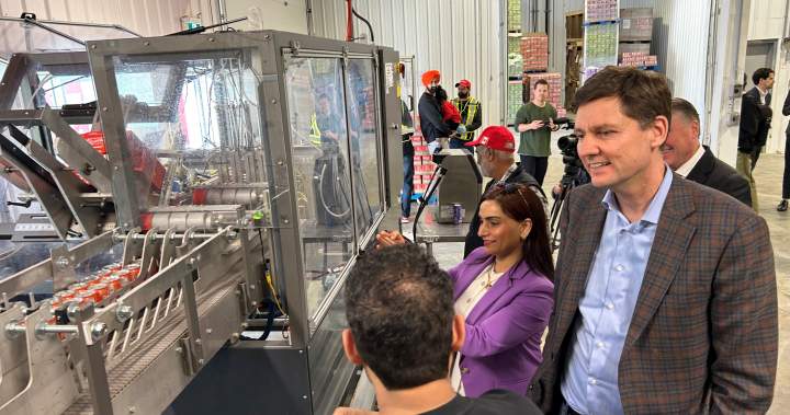 B.C. premier visits Kelowna soda producer to announce millions for other manufacturers