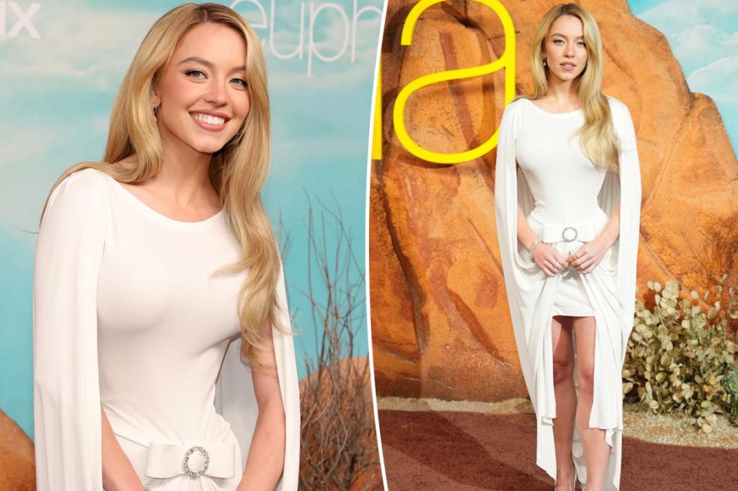 Sydney Sweeney is angelic in bow-tied white cape dress at ‘Euphoria’ Season 3 premiere