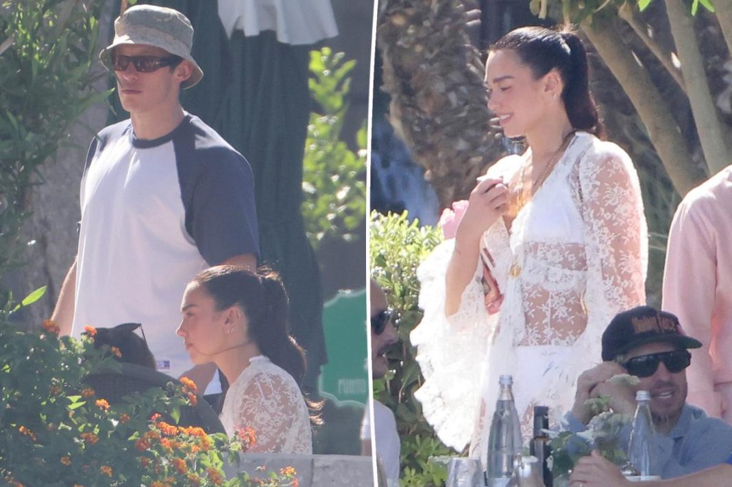 Dua Lipa radiates bridal vibes in white lace dress following wedding to Callum Turner