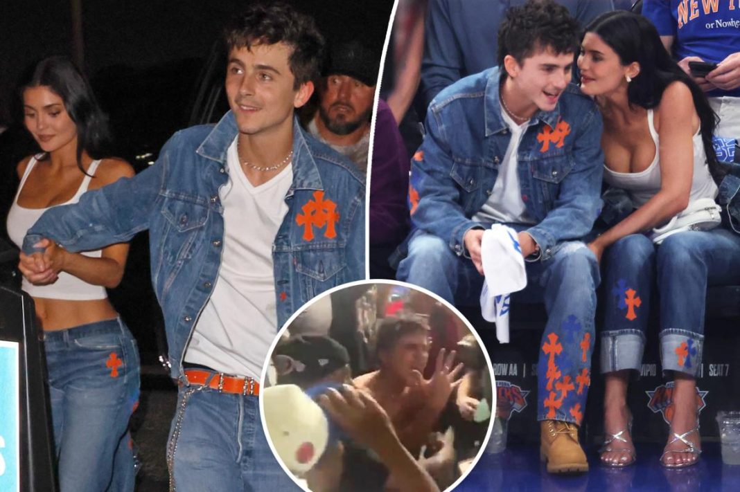 Timothée Chalamet rips off shirt, takes reporter’s mic in rowdy Knicks celebration as ‘proud girlfriend’ Kylie Jenner films him