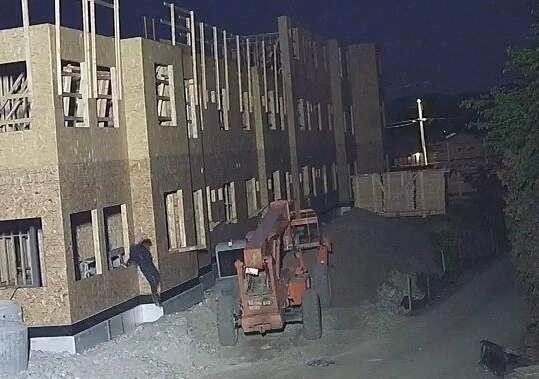 Photos show individual on Penticton construction site moments before destructive fire